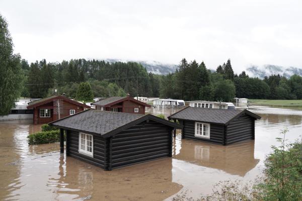 Flommen i Telemark har ført til ødeleggelser og over 300 evakuerte. Foto: Ole Berg-Rusten / NTB