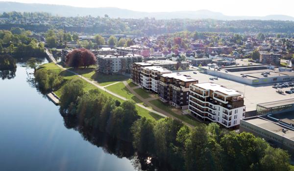 På Herkules Park skal det bygges totalt 85 boliger fordelt på fire leilighetsbygg, rett ved Hjellevannet i Skien. Illustrasjon: Arkitektkontoret Point.