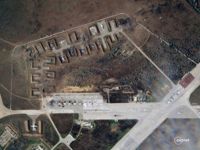 Satellitbild från Planet Labs PBC tagen efter explosionen på den ryska flygbasen Saky tisdagen den 9 augusti.