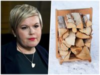 Annika Saarikko var tvungen att avstå från sin vedlast på flygplatsen i Kajana. Veden till höger härstammar inte från skogarna i Kuhmo.