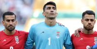 De iranska spelarna Ehsan Hajsafi, Alireza Beiranvand, Morteza Pouraliganji och deras lagkamrater förblev tysta då landets nationalsång spelades inför matchen mot England.