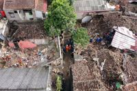 Jordskreded i Cugenang in Cianjur, på indonesiska ön Java den 24 november.