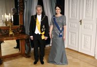 Presidentparet är redo att ta emot gästerna på Presidentens slott.