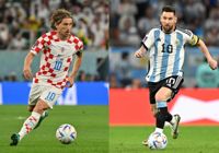 Luka Modric och Lionel Messi drabbar samman i den första semifinalen.