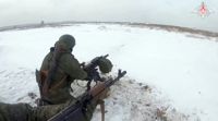 Ryska och belarusiska styrkor över tillsammans i Belarus. Bilden är distribuerad av ryska försvarsministeriet den 19 december.