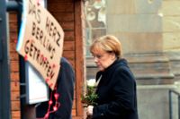 Angela Merkel hedrade offrens minne vid brottsplatsen i centrala Berlin.