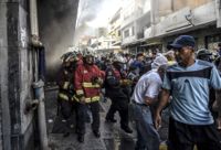 Brandkåren kallades in för att släcka en brand som demonstranter tänt vid en polisstation i Caracas.