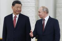 Kinas president Xi Jinping och Rysslands president Vladimir Putin diskuterade bland annat Kinas fredsplan för Ukaina. Bilden har förmedlats av den ryska statliga nyhetsbyrån Sputnik.