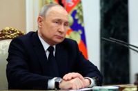 Rysslands president Vladimir Putin under ett möte på lördagen.