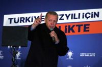 Turkiets sittande president Recep Tayyip Erdogan var segerviss under sitt nattliga tal Ankara.