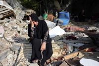 Invandrarfrågan är ett av de svåra ämnena för regeringsbildarna. På bilden en kvinna i ett flyktingläger i Gaza.