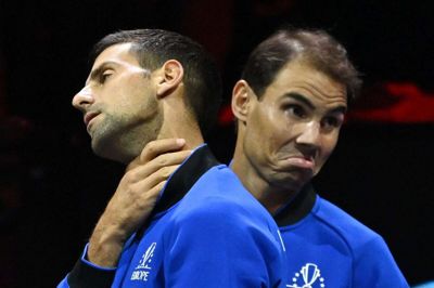 Rafael Nadal (til højre) og Novak Djokovic slipper for at møde hinanden i det indledende gruppespil i sæsonfinalen i tennis.