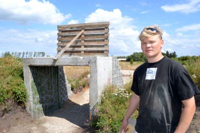 - Nu kommer vi igen fremad, siger initiativtager Christian Morgen Larsen, der står ved banens nybyggede tunnel