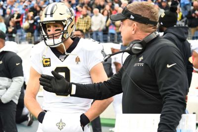 New Orleans Saints-cheftræner Sean Payton (til højre) er smittet med coronavirus. Her ses Sean Payton med stjernequarterback Drew Brees.