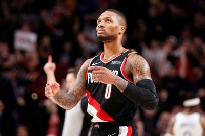 Portland Trail Blazers og Damian Lillard i kamp mod Golden State Warriors, mens der stadig var gang i NBA-sæsonen.