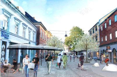 Til højre ses nogle af de legeelementer, der vil blive placeret fem steder på den nye gågadestrækning. De vil blive suppleret af et faldunderlag. ? Visualisering: Herning Kommune