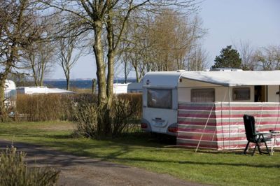 Gæsterne blev væk fra de danske campingpladserne i juli. Regnen får skylden. Foto: Colourbox