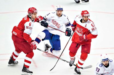 Stefan Lassen (t.v.) - her fredagens kamp mod Norge - glæder sig en fridag eefter et hårdt VM-program og nogle varme dage i Boxen. Foto: Henning Bagger/Ritzau Scanpix