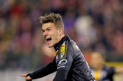 Alexander Scholz skriger sin glæde ud efter den matchvindende scoring i den belgiske pokalfinale 2014. Den bare 21-årige forsvarer headede bolden i mål med siden af hovedet - og lidt øret - til en overraskende 1-0-finalesejr for Lokeren. ?Foto: Ritzau Scanpix
