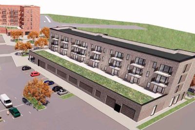 Fruehøjgaard planlagde at bygge 40 almene boliger i Gødstrup, men den plan er røget i vasken. Det skulle have været 24 lejligheder i tre etager oven på en dagligvarebutik (visualiseringen) samt 16 rækkehuse. Visualisering: Fruehøjgaard/Herning Kommune