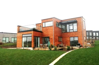 Lund Huse lavede blandt andet individuelle arkitekttegnede huse i træ, som det her beliggende på Sjælland. Foto. PR-foto