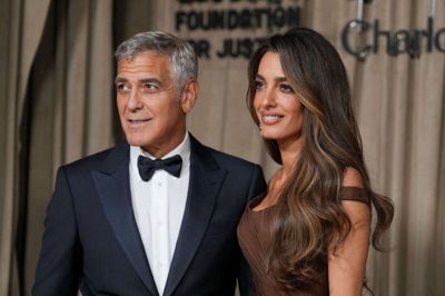 George Clooney, hustruen Amal Clooney og parrets to børn søger mere privatliv i det franske. (Arkivfoto).