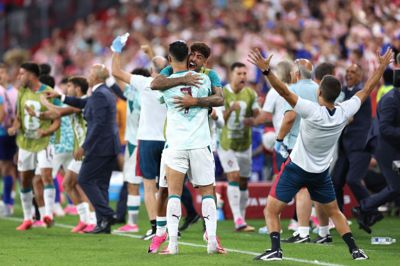 Portugals spillere jubler, efter at de har sikret sig sejren over Kroatien med en overtidsscoring ved VM i fodbold.