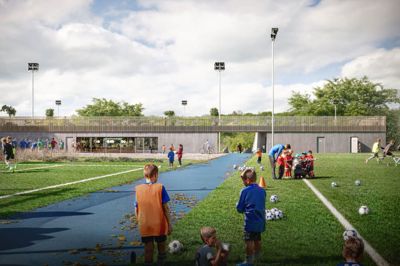 Sweco har lavet en illustration af, hvordan Fodboldens Hus kommer til at se ud på Søholt. I baggrunden er det den lille tribune, der bliver bygget.
