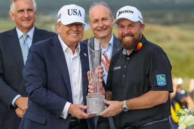 Shane Lowry (til højre) kommer ikke til at spille med i Abu Dhabi Championship.