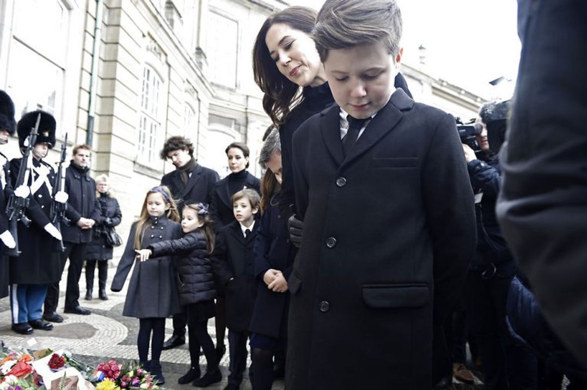 Crown Princess Mary and Prince Christian are looking at flowers in front of Amalienborg Palace on Thursday, February 15 2018. Prince Henrik died on Tuesday February 13 at Fredensborg Palace.. (Foto: Mads Claus Rasmussen/Scanpix 2018)