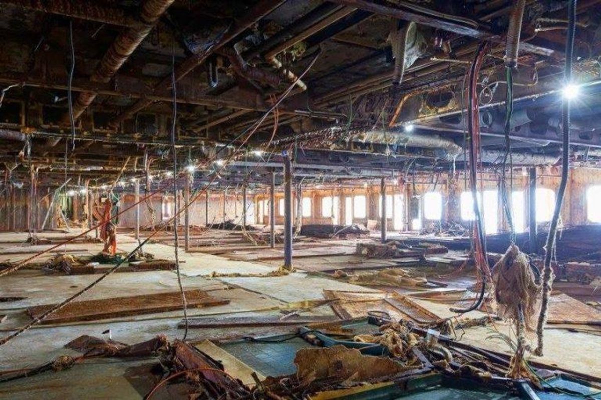 Sådan så Costa Concordia ud efter at have ligget i vandet i flere år. Foto: Hand outs.