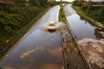 Vilde billeder: Melder ud om dobbelt skybrud