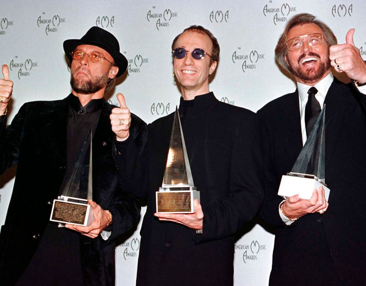 Brødrene Gibb, der som Bee Gees hærgede alverdens disko-hitlister fra starten af 1970’erne og et par årtier frem. Foto: Scanpix/REUTERS/Fred Prouser