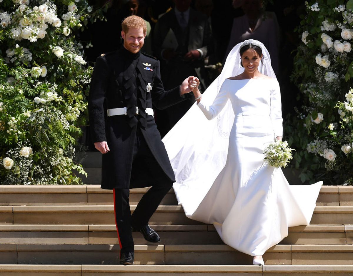 Da Meghan gav sit ja til Harry den 19. maj 2018 bar hun et brudeslør, med broderier af blomster fra de 54 Commonwealth lande. Klikk videre for flere billeder. Foto: Scanpix/Pool via REUTERS