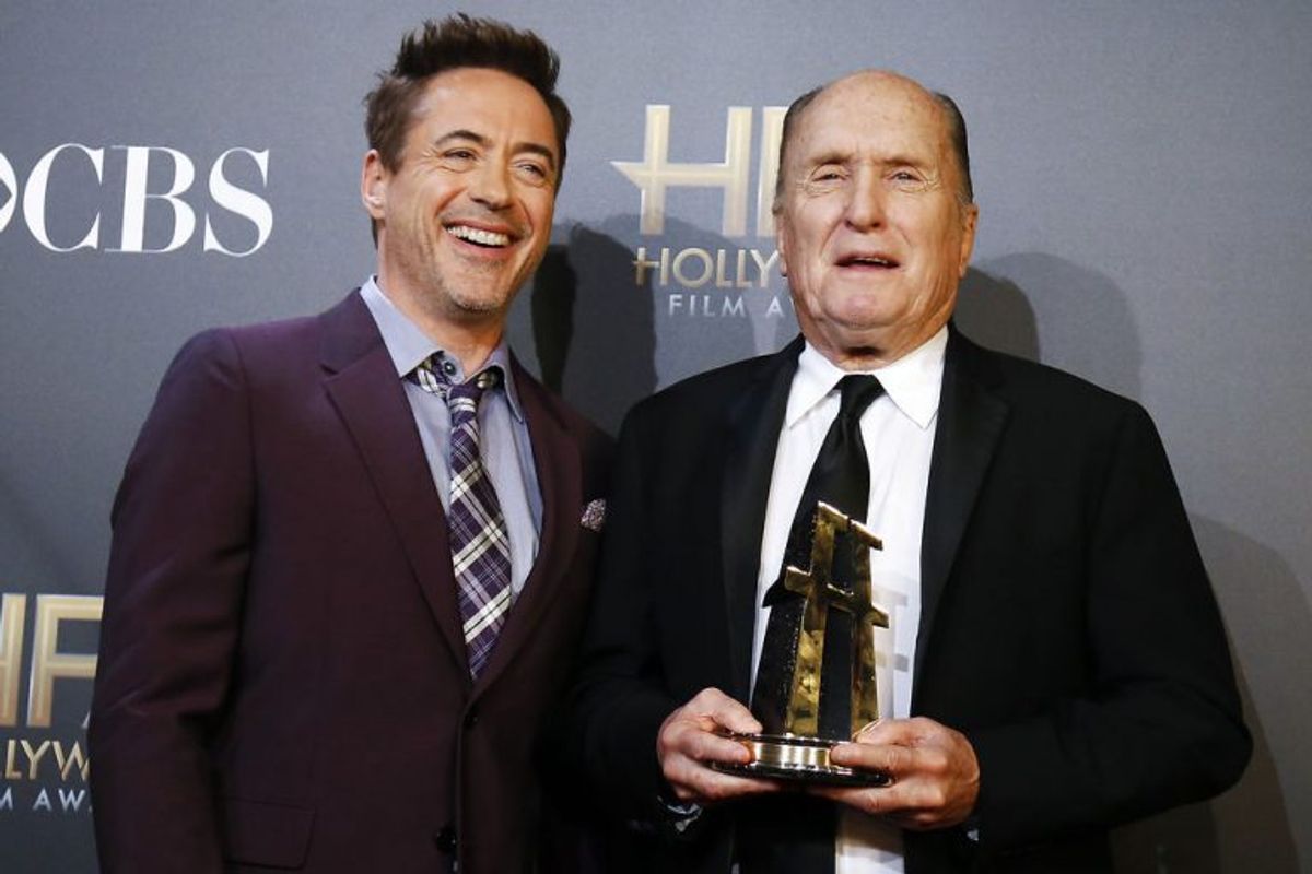 Her ses Robert Duvall med Robert Downey Jr. ved premieren på “The Judge” fra 2014. Arkivfoto: Danny Moloshok/Scanpix