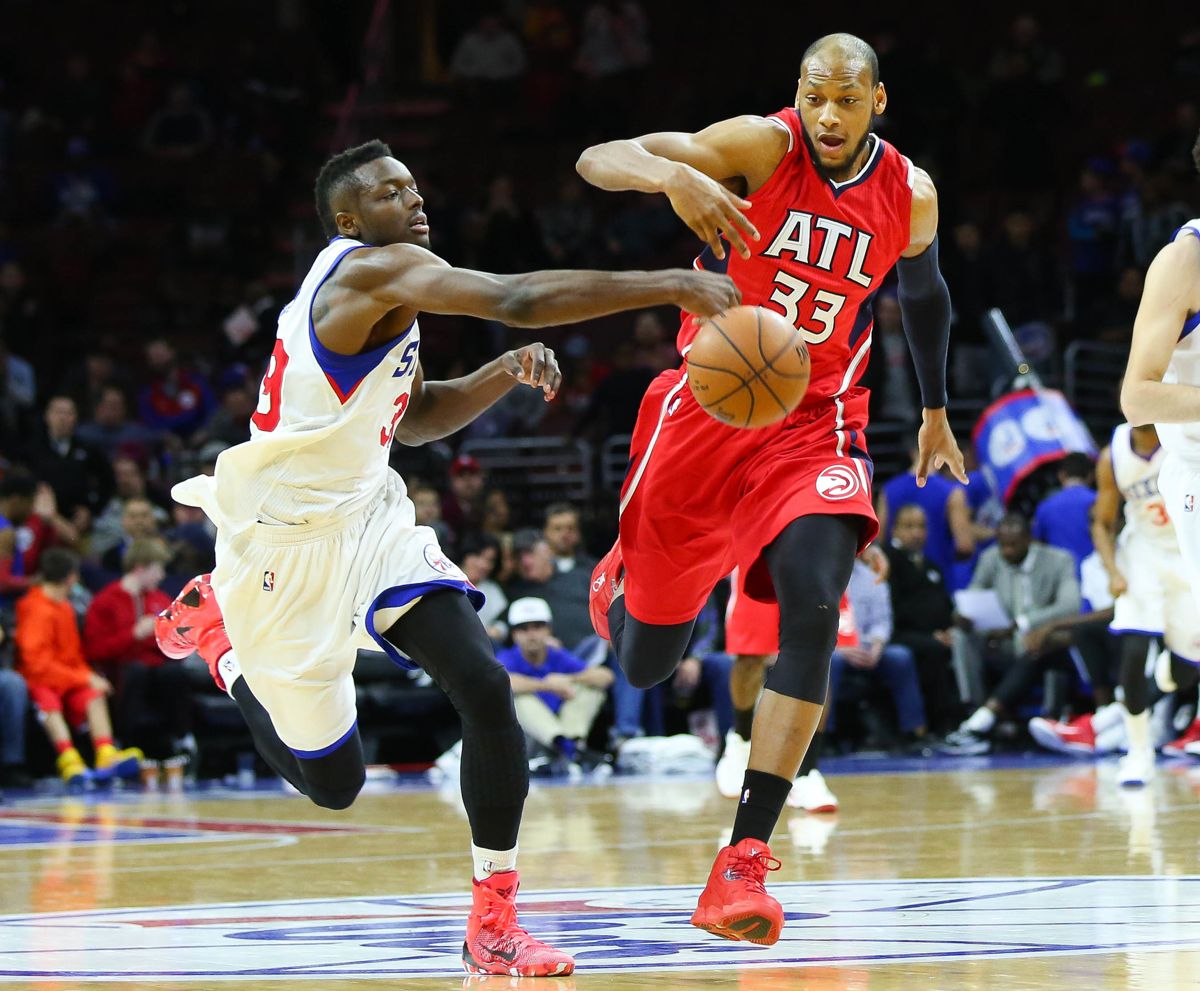 Adreian Payne til højre nåede at spille fem sæsoner i NBA.