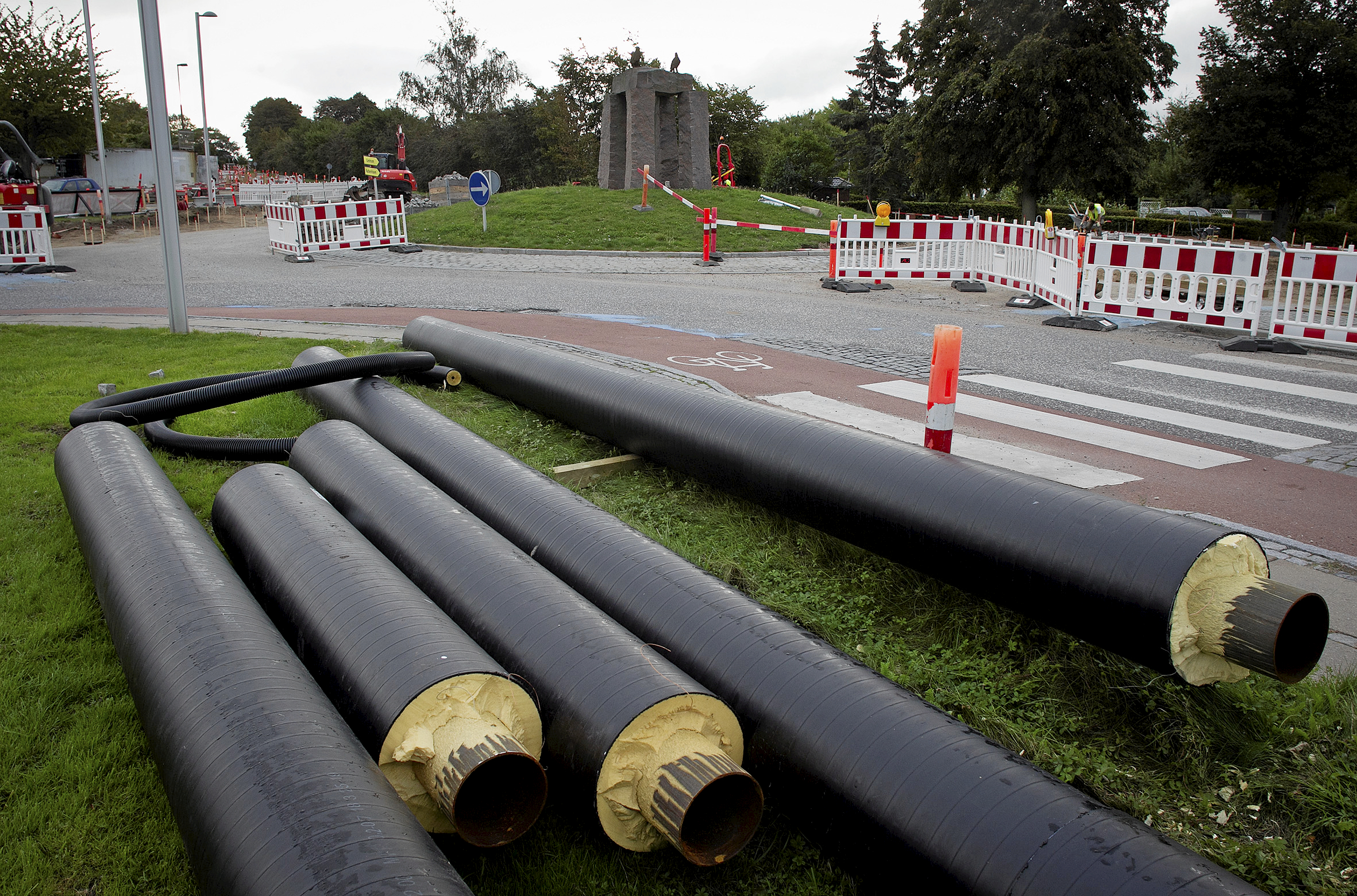 Kommunen og fjernvarmeselskabet strides om økonomien i den oprindelige aftale.