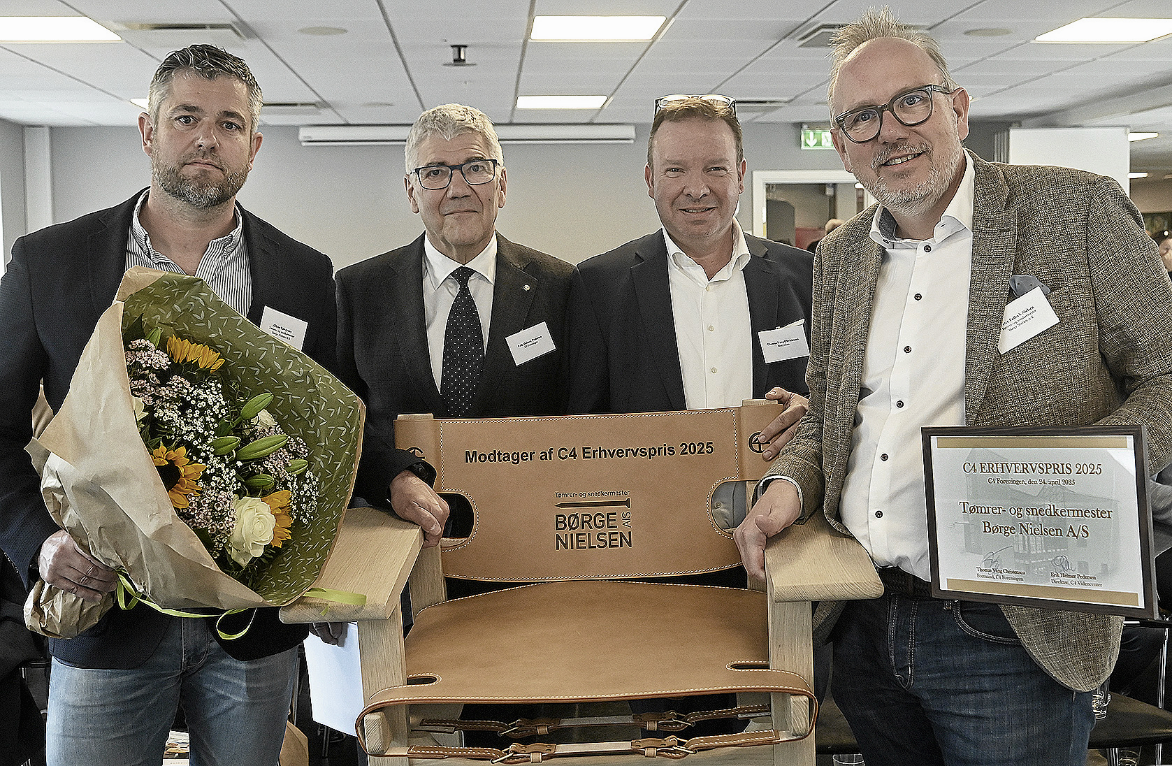 Årets C4-pris gik til et helt særligt Hillerødfirma. Her ses her ses: Claus Løvgreen, Erik Helmer Pedersen, Thomas Vang Christensen og Peter Følbæk.