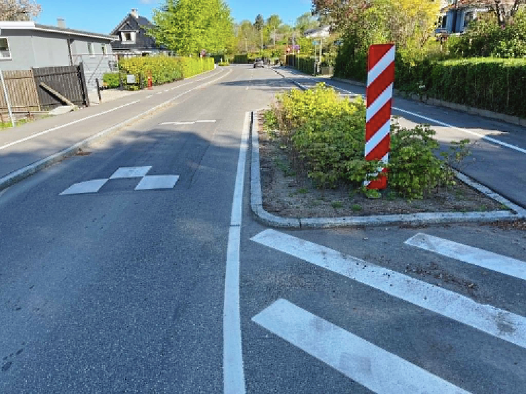 Otte ud af Strandvejens 26 vejbump viste sig at være for høje. De bliver nu lavet om